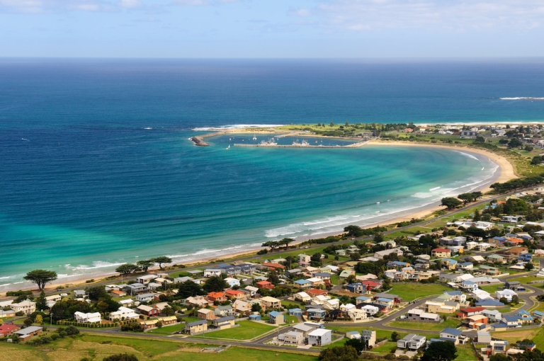 VUETRADE Coastal 316SS Apollo Bay Vic Airial view of houses coastline beach and turquoise water